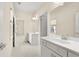 Bright bathroom with tile flooring, double sinks, and ample natural light at 4782 Lakeway, Alpharetta, GA 30005