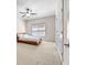Bedroom with neutral carpet, fan, window, and white door at 4782 Lakeway, Alpharetta, GA 30005