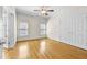 Cozy bedroom featuring hardwood floors, double closets and natural light at 4782 Lakeway, Alpharetta, GA 30005