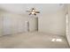 Spacious bonus room with neutral walls and carpet, recessed lighting, and a doorway to an ensuite at 4782 Lakeway, Alpharetta, GA 30005