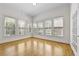 Bright bonus room featuring hardwood floors, neutral walls, and multiple windows providing ample natural light at 4782 Lakeway, Alpharetta, GA 30005