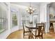 Breakfast nook with lots of natural light, features a door to the exterior and chandelier at 4782 Lakeway, Alpharetta, GA 30005