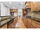 Spacious kitchen with custom cabinets, granite countertops, and stainless steel appliances at 4782 Lakeway, Alpharetta, GA 30005
