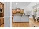 Eat-in kitchen featuring a large island with bar seating, custom cabinets and stainless appliances at 4782 Lakeway, Alpharetta, GA 30005