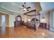 Spacious bedroom suite featuring a four poster bed and hardwood floors at 4981 Millwood Dr, Canton, GA 30114