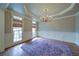 Refined dining room featuring hardwood floors, a chandelier, and natural light at 4981 Millwood Dr, Canton, GA 30114