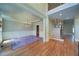 Elegant dining area featuring hardwood floors, a chandelier, and classic molding at 4981 Millwood Dr, Canton, GA 30114