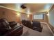 Home theater with comfortable leather seating and large screen at 4981 Millwood Dr, Canton, GA 30114