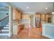 Kitchen features stainless steel appliances, hardwood floors, and light wood cabinets at 4981 Millwood Dr, Canton, GA 30114