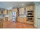 Kitchen features stainless steel appliances, double wall oven, hardwood floors, and granite counters at 4981 Millwood Dr, Canton, GA 30114