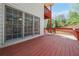 Inviting back deck featuring a small table and chairs, perfect for relaxing and enjoying outdoor living at 2924 Meadow Church Rd, Suwanee, GA 30024