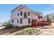 Exterior of home highlighting spacious backyard, back deck, second story deck, and natural light at 2924 Meadow Church Rd, Suwanee, GA 30024