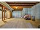 Unfinished basement with concrete walls, exposed ceiling and duct work ready for customization at 2924 Meadow Church Rd, Suwanee, GA 30024