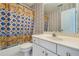 Cozy bathroom with tub, toilet, and sunflower shower curtain at 2924 Meadow Church Rd, Suwanee, GA 30024