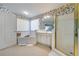 This bathroom features patterned wallpaper, a large shower and a tub next to a window at 2924 Meadow Church Rd, Suwanee, GA 30024