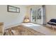 Serene bedroom featuring ample natural light, neutral colors, and a cozy rug at 2924 Meadow Church Rd, Suwanee, GA 30024