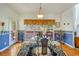 Cozy breakfast nook with bright window, chandelier and floral curtains and walls at 2924 Meadow Church Rd, Suwanee, GA 30024