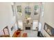 Bright living room with fireplace, three large windows, and hardwood floors at 2924 Meadow Church Rd, Suwanee, GA 30024