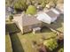 Aerial backyard featuring a well-maintained lawn and wood fence for privacy at 3354 Preserve Run Trl, Loganville, GA 30052