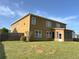 Large backyard with lawn, patio area, and wood fence offering privacy and outdoor space at 3354 Preserve Run Trl, Loganville, GA 30052