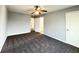 Bedroom boasts neutral walls, plush carpet, and doorway view into the ensuite bathroom at 3354 Preserve Run Trl, Loganville, GA 30052