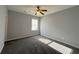 Bedroom with neutral walls, carpet, and window at 3354 Preserve Run Trl, Loganville, GA 30052