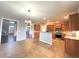 Spacious kitchen with stainless steel appliances, wooden cabinetry and large island perfect for entertaining at 3354 Preserve Run Trl, Loganville, GA 30052
