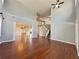 Spacious living room featuring hardwood floors, staircase, and soaring ceilings at 3354 Preserve Run Trl, Loganville, GA 30052