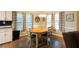 Sunny dining room featuring a wooden table, neutral walls, and lots of natural light at 355 Freeman Dr, Covington, GA 30016