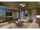 A finished basement area with neutral colors and wood-look flooring, ideal for extra living space and entertaining at 7535 Asbury Dr, Riverdale, GA 30274