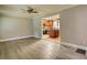 Bright living room with wood floors at 7535 Asbury Dr, Riverdale, GA 30274