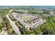 Panoramic aerial view of a residential neighborhood surrounded by lush greenery at 930 Crestview Dr, Johns Creek, GA 30024