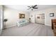 Inviting living room with comfortable seating, plush carpet, and ample natural light at 930 Crestview Dr, Johns Creek, GA 30024