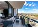 Spacious outdoor balcony with ample seating and a view of the city skyline at 2425 Peachtree Ne Rd # 1211, Atlanta, GA 30305