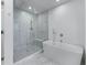 Contemporary bathroom featuring a separate shower and soaking tub with sleek, modern fixtures at 2425 Peachtree Ne Rd # 1211, Atlanta, GA 30305
