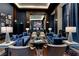 Stylish lobby featuring comfortable seating, modern decor, and a large screen television at 2425 Peachtree Ne Rd # 1211, Atlanta, GA 30305