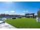 Rooftop amenities include a turf lawn, lounge area, and beautiful views of the surrounding city at 2425 Peachtree Ne Rd # 1211, Atlanta, GA 30305