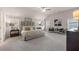 Spacious bedroom with high ceilings, neutral tones, large windows, and seating offering a comfortable retreat at 4504 Ajo Lot#2 Walk, Atlanta, GA 30331