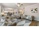 Inviting living room open to the kitchen, complete with modern furnishings and stylish decor at 4504 Ajo Lot#2 Walk, Atlanta, GA 30331