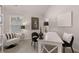 Bright home office with a white desk, stylish chair, and window, ideal for working or studying from home at 4504 Ajo Lot#2 Walk, Atlanta, GA 30331