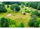 Overhead view of expansive property featuring lush landscaping, ample land, and a serene setting at 3545 Liberty Rd, Villa Rica, GA 30180