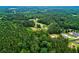Stunning overhead capture of a vast property with lush forestry at 3545 Liberty Rd, Villa Rica, GA 30180