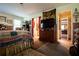 Quaint primary bedroom provides decor, a bed, and an en-suite bath at 3545 Liberty Rd, Villa Rica, GA 30180