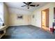 Bedroom with doorway to hallway and bathroom, neutral walls, and carpet at 3545 Liberty Rd, Villa Rica, GA 30180