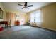 Bedroom with ceiling fan, double closets, and neutral walls and carpet at 3545 Liberty Rd, Villa Rica, GA 30180