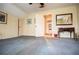 Spacious bedroom with neutral walls, carpet, and decorative mirror and table at 3545 Liberty Rd, Villa Rica, GA 30180