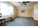 Bright bedroom with a ceiling fan, soft natural light, and classic decor at 3545 Liberty Rd, Villa Rica, GA 30180
