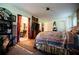 Well-decorated bedroom boasts decor, a bed, and an open en-suite bathroom at 3545 Liberty Rd, Villa Rica, GA 30180
