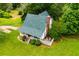 Inviting home with cozy porch and deck, perfect for enjoying the serene, green surroundings at 3545 Liberty Rd, Villa Rica, GA 30180