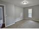 Cozy bedroom with carpet, neutral paint and a window at 4232 Chickasaw Trl, Douglasville, GA 30135